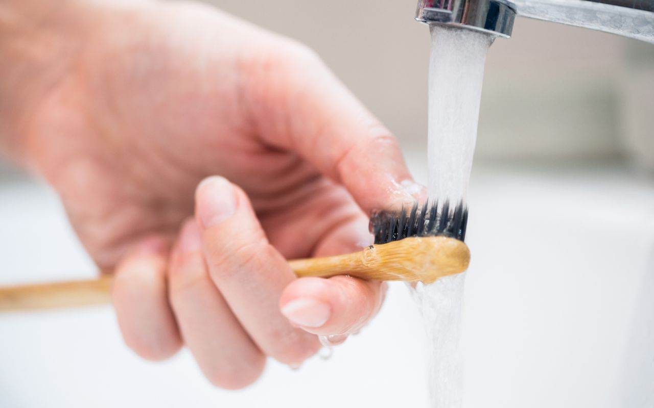 run-your-toothbrush-under-hot-water-to-sanitize-it